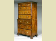 George I period walnut veneered chest on chest with inlaid starburst pattern, circa 1720