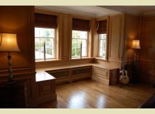 Light flooding into the newly panelled music room.