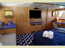 Hand waxed and polished interior for a private yacht by Hallidays, with sliding doors to bathroom