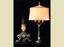A pair of French Empire period bronze and gilded candelabra, now converted to lamps