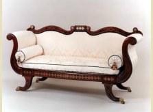 A brass inlaid, Regency period mahogany framed sofa