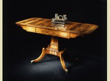 A barss inlaid Regency rosewood veneered sofa table with Regency coromandel inkstand